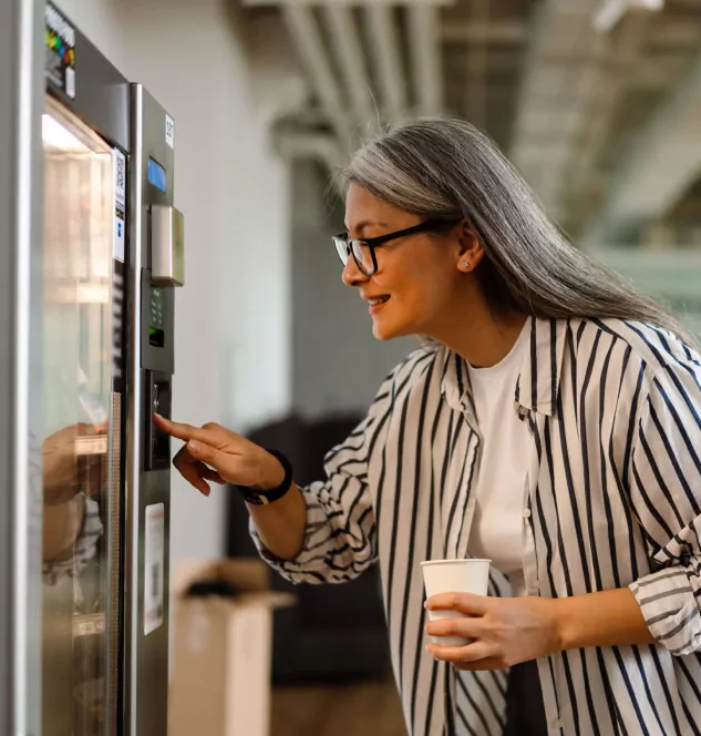 woman at vending machine